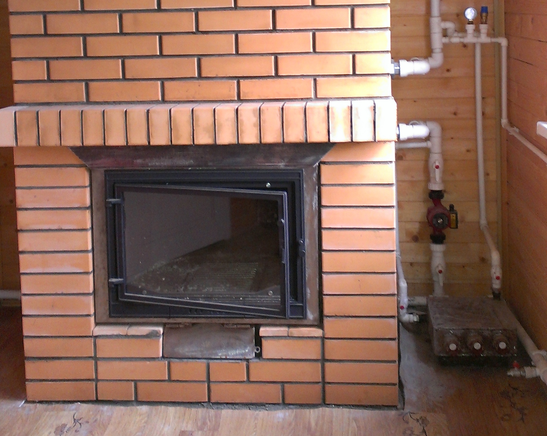 печь камин из кирпича для отопления дома